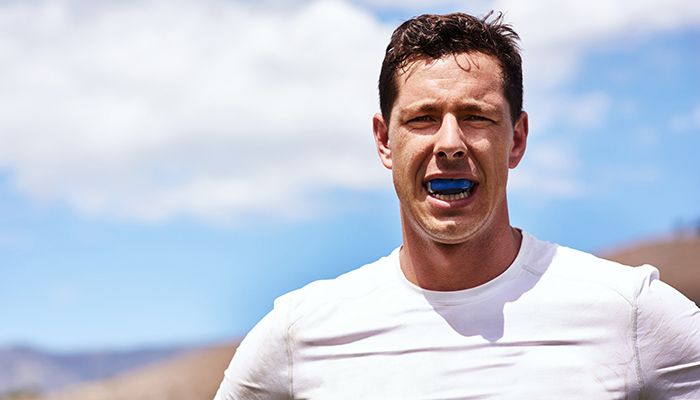 Man wears athletic guard