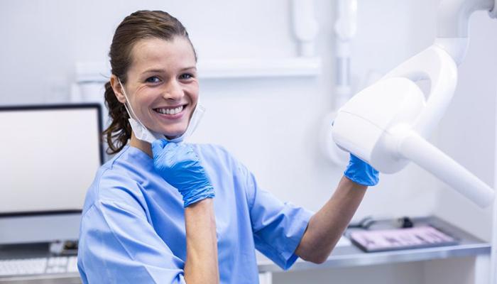 Dental hygienist smiles