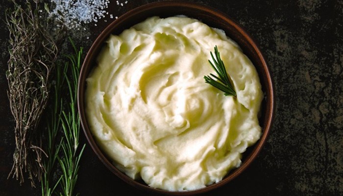 a bowl of mashed potatoes for dental implant post-op instructions