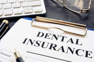 Paperwork for dental insurance coverage in St. Peters