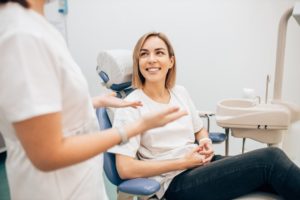 a woman smiling after her smile makeover